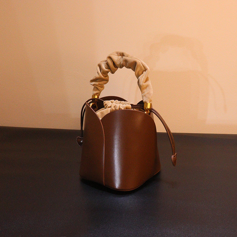 Women's Bags 2025 New Bucket Bag Niche Design Vegetable Basket Bag High-End Petal Flower Hand-Held Crossbody Bag