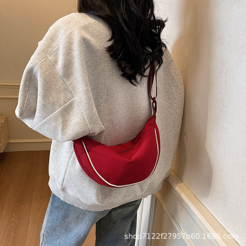 Simple High-grade Texture Canvas Bag Women's 2025 New Niche Design Crossbody Bag Casual Commuter Dumpling Bag
